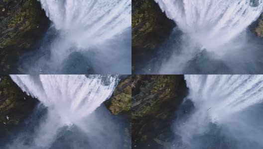 用无人机飞越冰岛著名的斯科加瀑布。高清在线视频素材下载