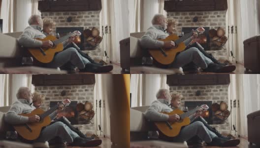 爷爷给奶奶和孙子弹吉他高清在线视频素材下载