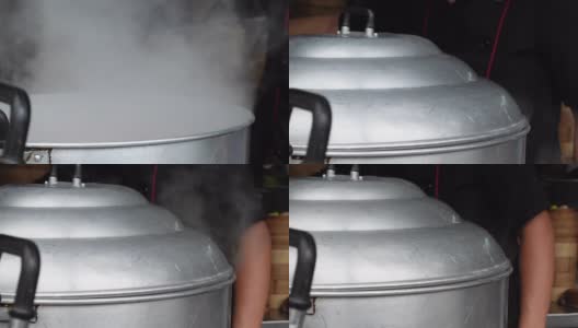 厨师负责制作和蒸中式粤式点心不锈钢锅高清在线视频素材下载