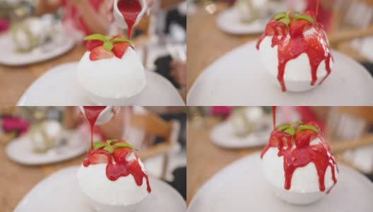 冰酥甜品浇上草莓酱，平底锅靠近高清在线视频素材下载