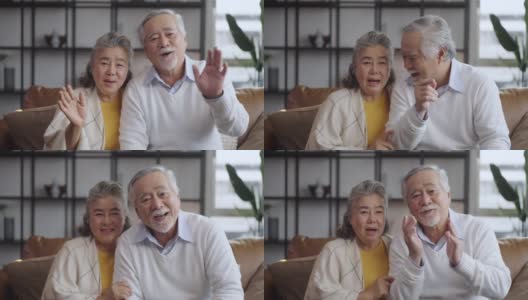 亚洲成熟的老夫妇在家里看着摄像机说话。在线聊天中的视频通话高清在线视频素材下载
