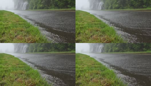 蓝岭公园大道下大雨高清在线视频素材下载