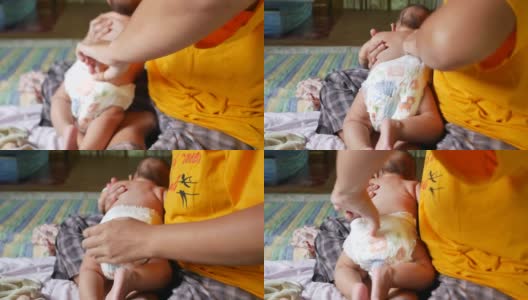 亚洲宝宝在家洗澡后穿衣服高清在线视频素材下载