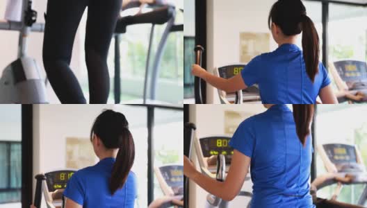 亚洲女人在椭圆机交叉训练器上锻炼高清在线视频素材下载