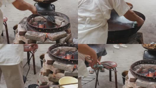 厨师在锅里换煤高清在线视频素材下载