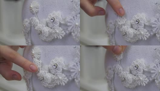 缝制白色花边的婚礼发饰高清在线视频素材下载