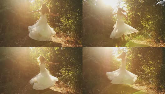 美丽的女纺纱新娘服饰慢动作森林自然高清在线视频素材下载