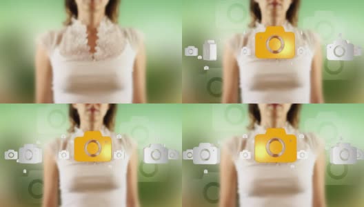 年轻女性触摸屏幕上的相机符号出现高清在线视频素材下载