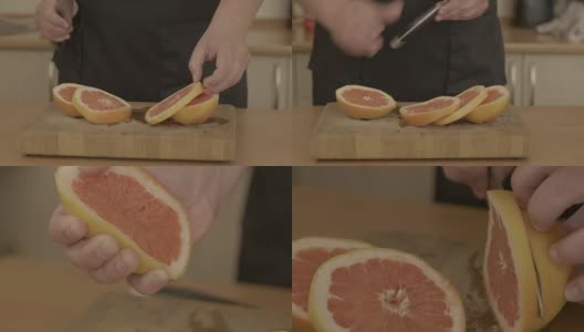 男人的手正在切新鲜的橘子高清在线视频素材下载