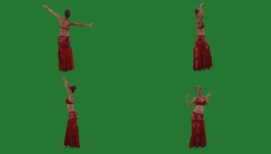 舞者。肚皮舞。肚皮舞者跳舞。绿色的屏幕。性感的红裙子高清在线视频素材下载