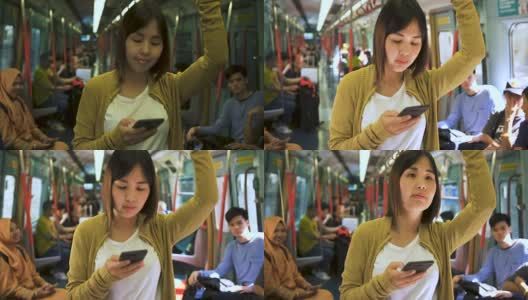 美丽的女人在火车上使用智能手机高清在线视频素材下载