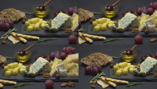 各种奶酪的视频-帕尔马干酪，布里干酪，切达干酪和羊乳干酪高清在线视频素材下载