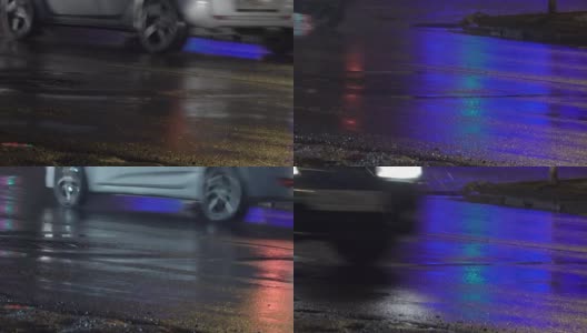 雨天在城市道路上行驶的车辆。汽车在高速公路上行驶，大雨倾盆。城市晚上天气潮湿。高清在线视频素材下载