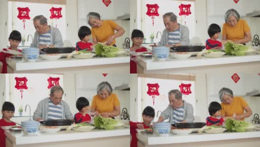 春节时，孙辈们帮忙准备火锅高清在线视频素材下载