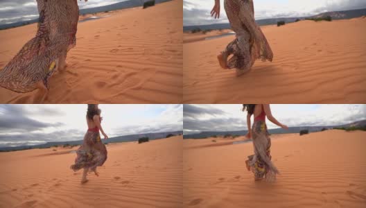 在沙丘上奔跑的女人高清在线视频素材下载
