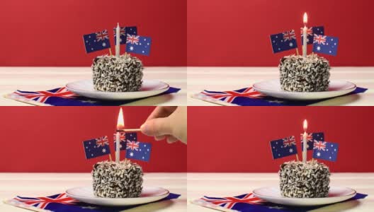 蜡烛拉明顿蛋糕。澳洲国庆日快乐。高清在线视频素材下载