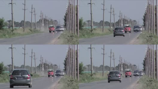 阿根廷圣达菲省农村道路上的汽车和卡车。高清在线视频素材下载
