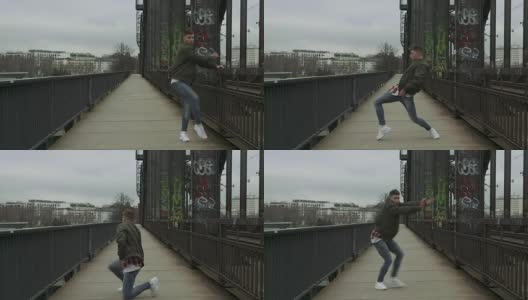 城市舞者在桥铁轨上跳舞高清在线视频素材下载