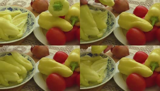 西红柿和辣椒放在盘子里高清在线视频素材下载