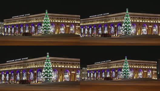 圣诞节(新年假期)中央儿童商店卢比扬卡(俄语题词)在晚上的照明，莫斯科，俄罗斯高清在线视频素材下载