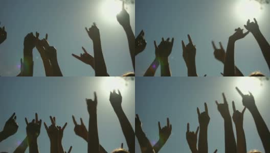 举起的手显示摇滚标志的喇叭手势，摇滚音乐会，派对时间高清在线视频素材下载