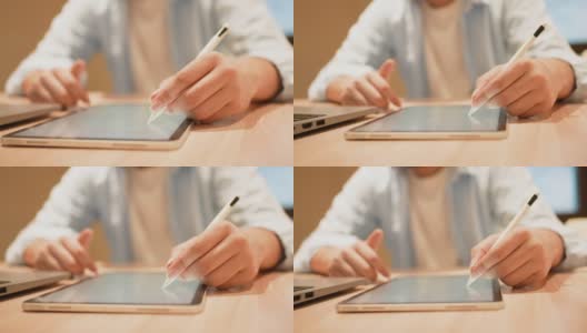慢动作场景插图画家手使用手写笔在办公室的数字平板电脑上创作或绘制关于艺术创作的职业概念高清在线视频素材下载