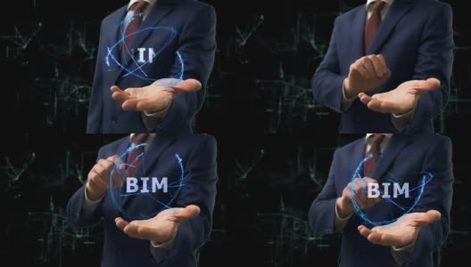 商人在他的手上展示BIM的概念全息图高清在线视频素材下载
