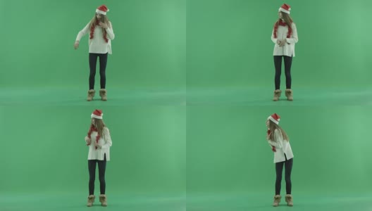 迷人的年轻女子戴着圣诞帽叫人来，色度键在背景高清在线视频素材下载