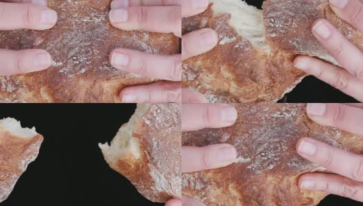 用手掰开刚烤好的面包的慢动作高清在线视频素材下载