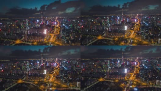 日落之夜照亮了著名的深圳城市交通市中心航拍全景4k倾斜shift时间流逝中国高清在线视频素材下载