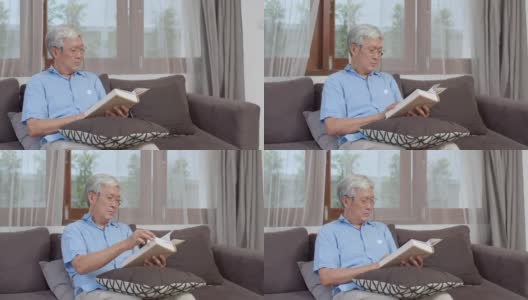 亚洲的老男人在家里放松。亚洲资深华人男性享受休息时间躺在家里客厅的沙发上看书的概念。高清在线视频素材下载