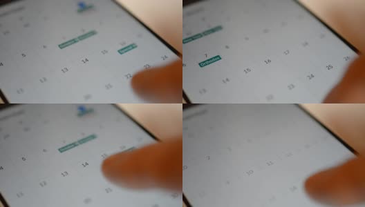 近距离的手指浏览智能手机日历。高清在线视频素材下载