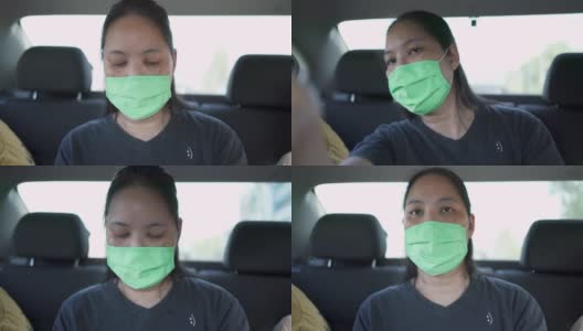 女乘客戴着口罩在出租车上告诉司机该怎么走高清在线视频素材下载