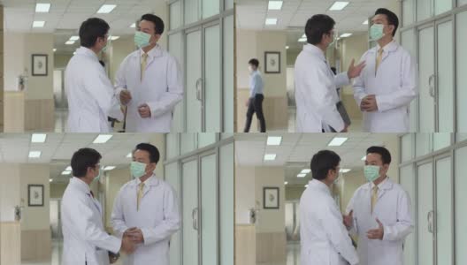 医生和同事站在医院走廊上高清在线视频素材下载