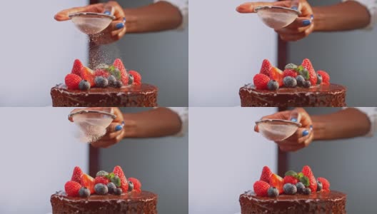 SLO MO LD女手往巧克力蛋糕上撒细砂糖高清在线视频素材下载
