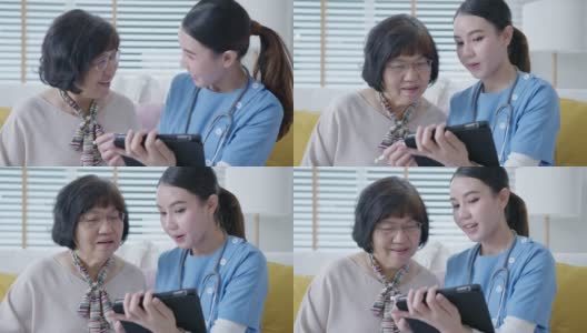 年轻的亚洲女性护士，辅助生活，家庭护理员或医生在家里拜访老年人，在平板电脑上在线谈论结果跟踪检查表，保健建议或处方。高清在线视频素材下载