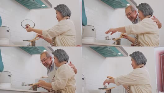 夫妇老亚洲长者幸福生活在家庭厨房。爷爷和奶奶一起煮沙拉菜，快乐地微笑着一起享受退休生活。老年人的关系和活动。高清在线视频素材下载
