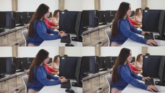 年轻的学生在教室里使用电脑高清在线视频素材下载