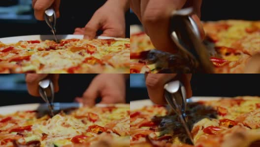 特写人物将意大利披萨切成碎片放在盘子上高清在线视频素材下载