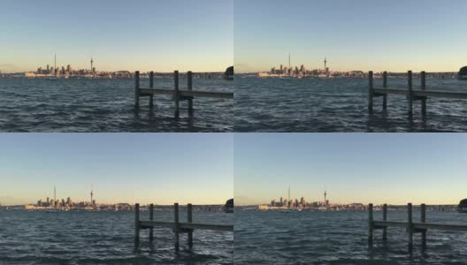 奥克兰城市天际线新西兰与一个空木码头在日落高清在线视频素材下载