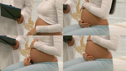 医生给他怀孕的病人看病历高清在线视频素材下载