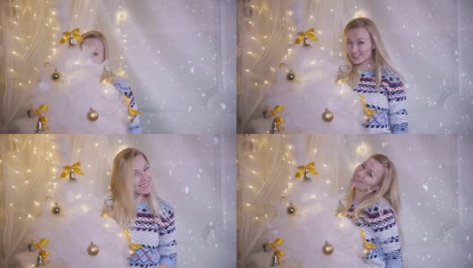 漂亮的女孩正在装饰新年树高清在线视频素材下载