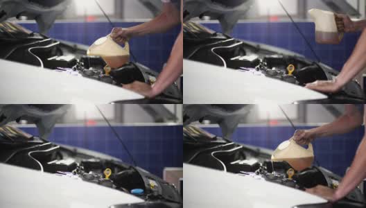 汽车修理工正在换机油高清在线视频素材下载