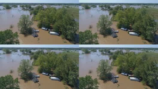 盘旋在洪水之上的房屋淹没了哥伦布，德克萨斯州的小镇海湾沿岸的破坏区域，飓风哈维路径的破坏。高清在线视频素材下载