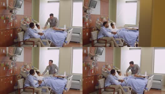 儿科医生在医院探访父亲和孩子，用R3D拍摄高清在线视频素材下载