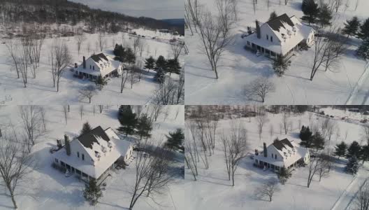 高角度向前Flyover乡村房子在冬天高清在线视频素材下载
