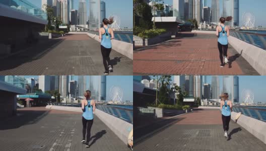 年轻的健身女性跑步在香港城市。红色的史诗。高清在线视频素材下载
