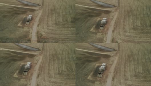 鸟瞰图在早春风暴油田和中西部农业4K视频高清在线视频素材下载