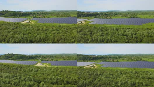 鸟瞰图的大型可持续发电厂与许多排太阳能光伏板生产清洁的生态电能。零排放概念的可再生电力高清在线视频素材下载