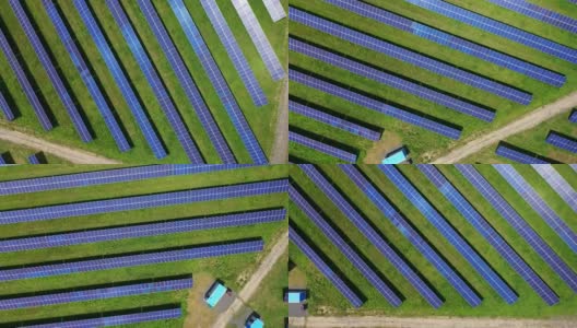 当代太阳能农场。一排排的蓝色阳光电池坐落在绿色的田野上。创新的清洁阳光能源收集器。鸟瞰图。轨道的看法。高清在线视频素材下载